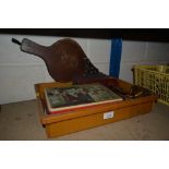 A collection of old advertising tins and a pair of