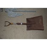 A vintage short handled coal shovel