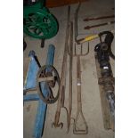 A quantity of long handled tools including a pitch