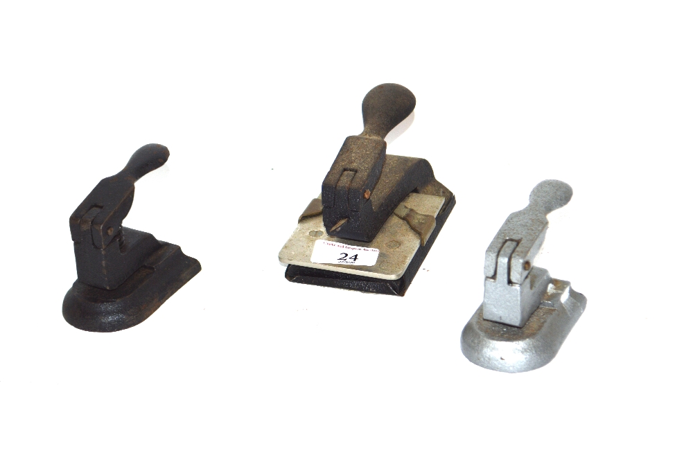 Three vintage office hole punches