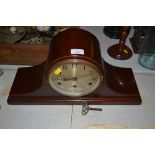 A large vintage walnut mantel clock, with chiming movem