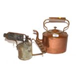 An Antique copper kettle and a blow lamp