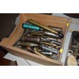A collection of vintage grease guns etc.