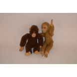 A Steiff monkey and another vintage monkey with gl
