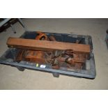 A box of vintage jack planes and other wooden plan