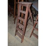 A set of wooden steps approx. 51ins tall