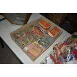 A box of vintage packaging, various games etc.