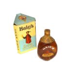 A Haig's dimple bottle of Scotch whisky, in origin