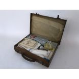 A World War II leather cased First Aid kit