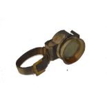 An early possibly wrist worn cycle lamp