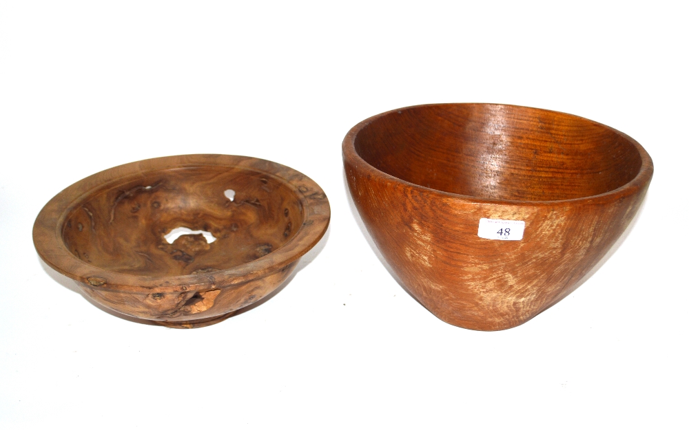 A turned burrwood circular bowl and another