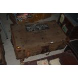 A canvas and leather bound campaign trunk with pai