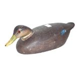 An American wooden decoy duck, signed Ken Harris 1