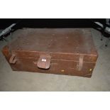 A large leather covered travelling case
