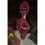 A wicker shop mannequin