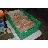 A large box and tray of play bricks and blocks