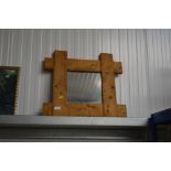 A pine framed mirror