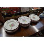 A collection of Luneville floral decorated dinnerw