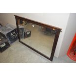 An oak overmantel mirror