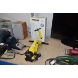 A Karcher steam cleaner