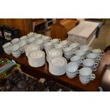 A collection of "Mayfair" patterned cups and saucers