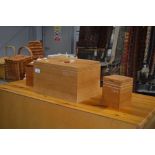 A wooden bread bin and contents and wooden storage