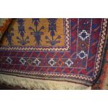 An approx 4'5" x 2'11" patterned rug