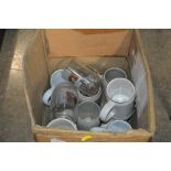 A box of glass and china tankards