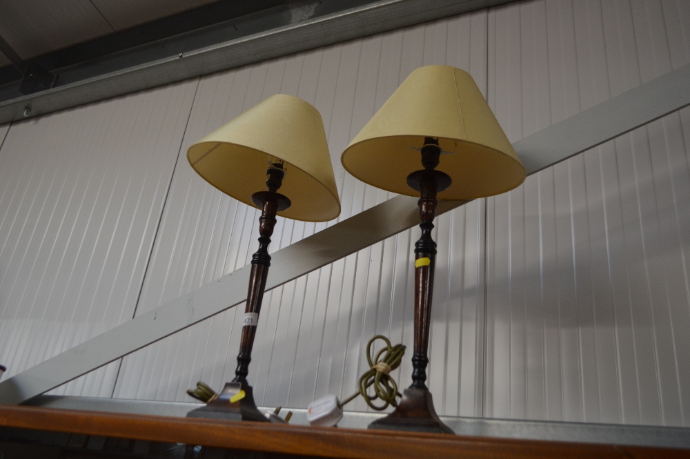 A pair of table lamps and shades