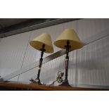 A pair of table lamps and shades