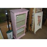 A painted and glazed cabinet