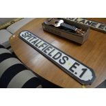 A wooden sign "Spitalfields"