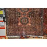 An approx. 3'3" x 1'8 Bokara rug