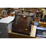 A mahogany and brass coal box