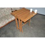 A hardwood folding garden table