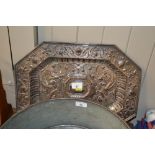 A heavy ornate silver plated tray decorated with c