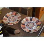 A pair of 19th Century Imari patterned saucer dish