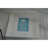 A framed print "Every Cloud has a Silver Lining"