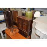 A mahogany inlaid two door cupboard of small propo