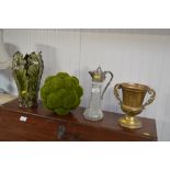 A claret jug; together with a leaf decorated vase