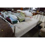 A single bed frame and Sealy mattress