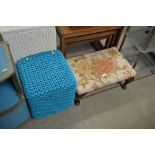 An upholstered footstool together with a one other