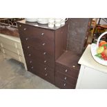 A modern bedside chest fitted three drawers with m