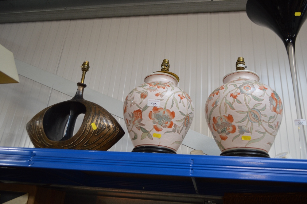 Two pottery table lamps; together with one other