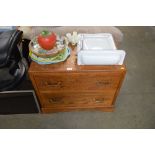 An oak chest fitted two long drawers