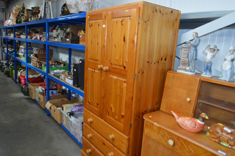 A pine wardrobe fitted three drawers below AF