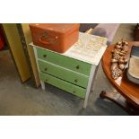 A painted three drawer chest