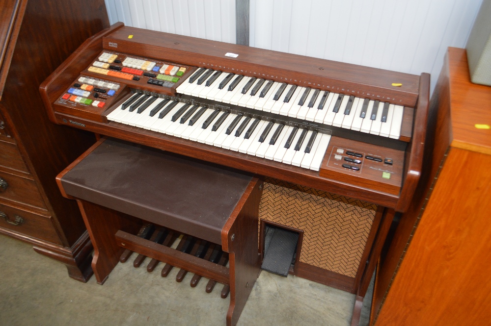 A Technics keyboard and stool