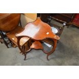 A late Victorian shaped walnut corner table