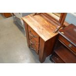 A hard wood chest fitted three drawers